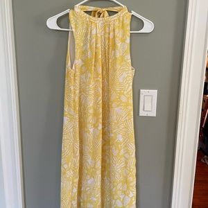 Sleeveless sheath, tie neck